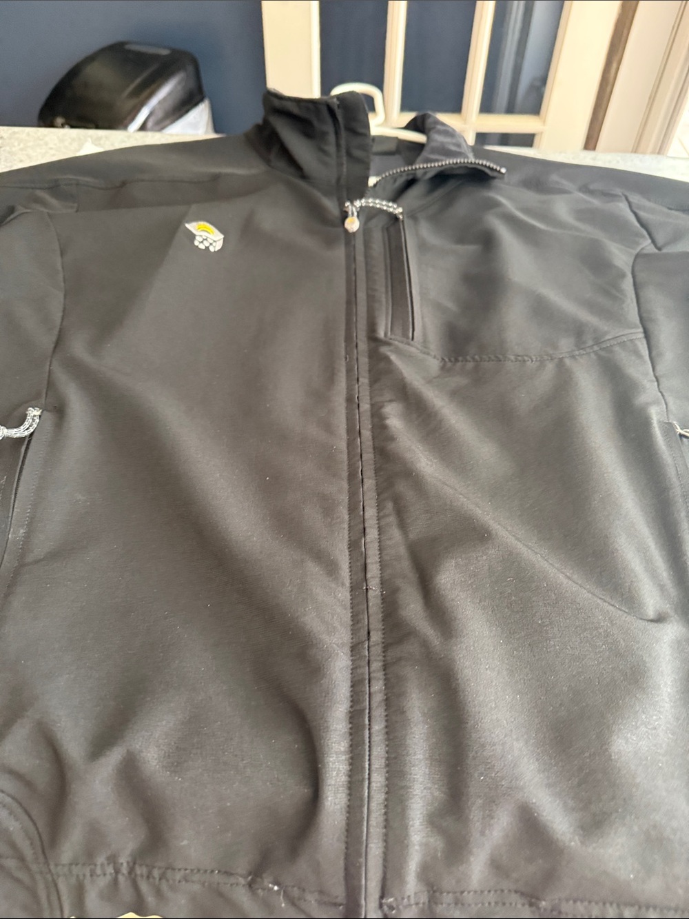 Mountain Hard Wear black jacket.